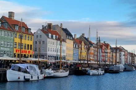 Nyhavn canal with colorful houses and boats in Copenhagen, Denmark
